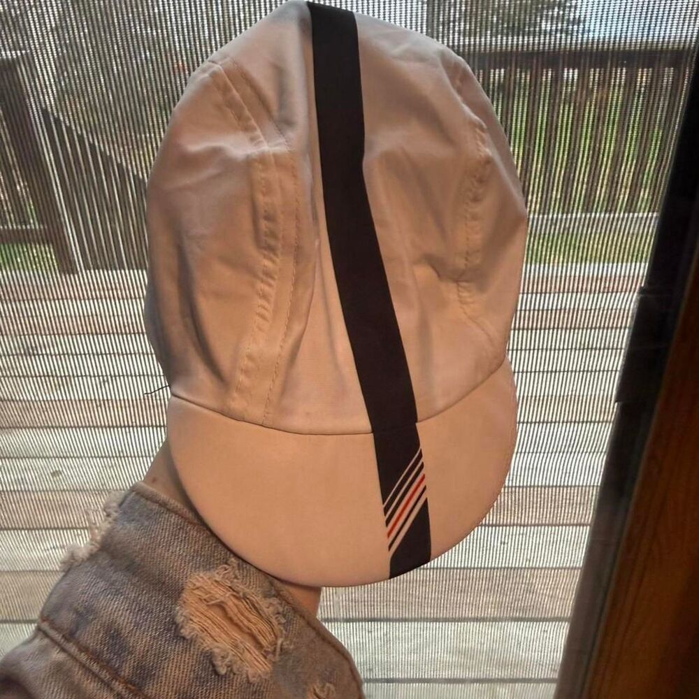 Baby sun hat that looks like a baseball cap.